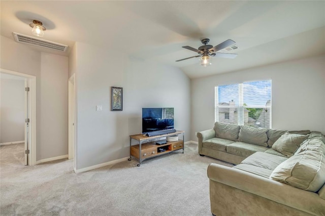 living room with visible vents, baseboards, ceiling fan, and light colored carpet