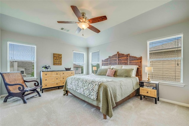 1103 Snow Goose, Leander, TX 78641 - bedroom featuring baseboards, multiple windows, light carpet, and visible vents