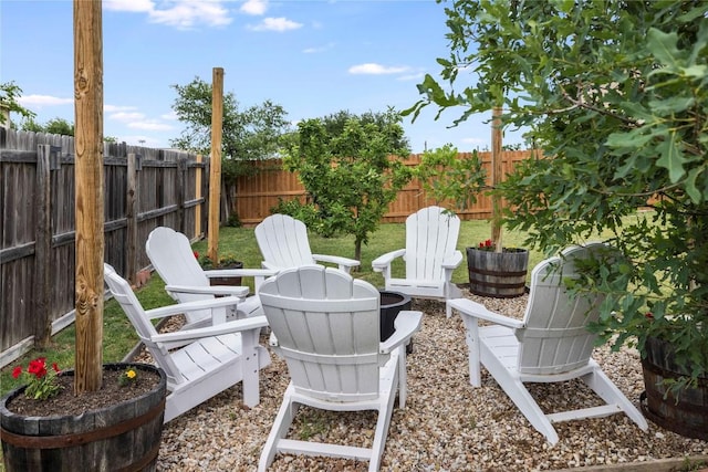 1103 Snow Goose, Leander, TX 78641 - view of patio with a fenced backyard and an outdoor fire pit