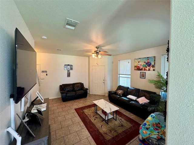 10608 Plains Trl Unit B, Austin, TX 78758 - tiled living room with ceiling fan