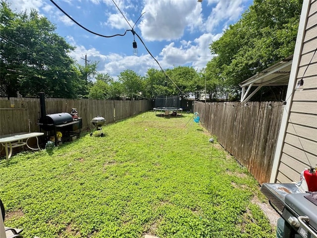 10608 Plains Trl Unit B, Austin, TX 78758 - view of yard featuring a trampoline