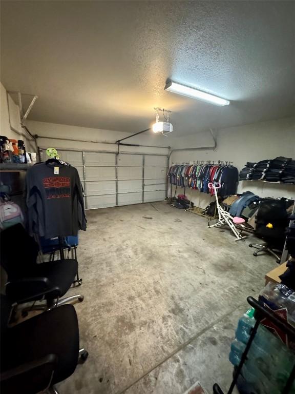 10608 Plains Trl Unit B, Austin, TX 78758 - garage featuring a garage door opener