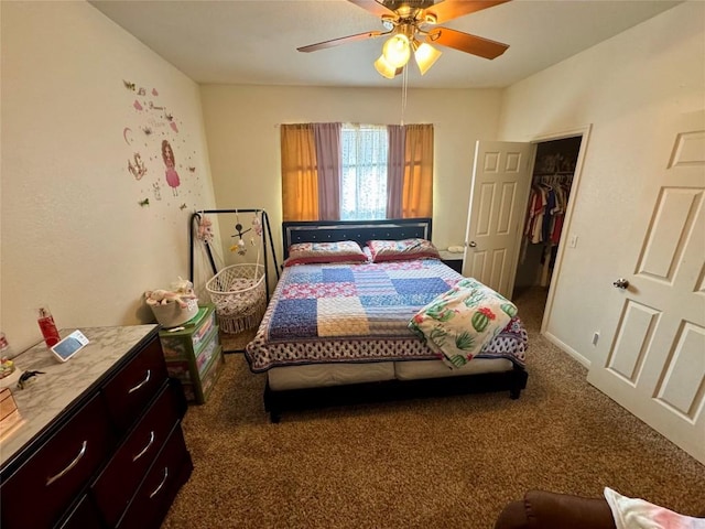 10608 Plains Trl Unit B, Austin, TX 78758 - carpeted bedroom featuring a walk in closet and ceiling fan
