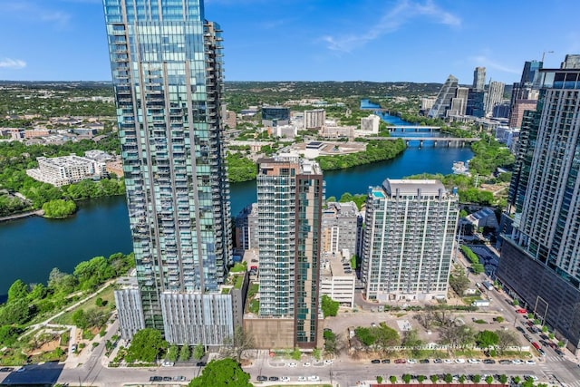 bird's eye view featuring a water view and a city view