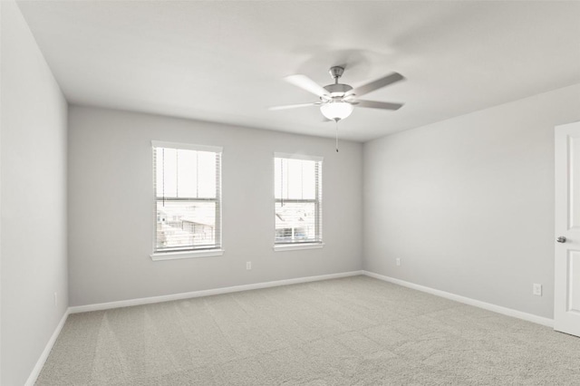 18305 Emu Ln, Manor, TX 78653 - unfurnished room featuring light carpet, baseboards, and ceiling fan