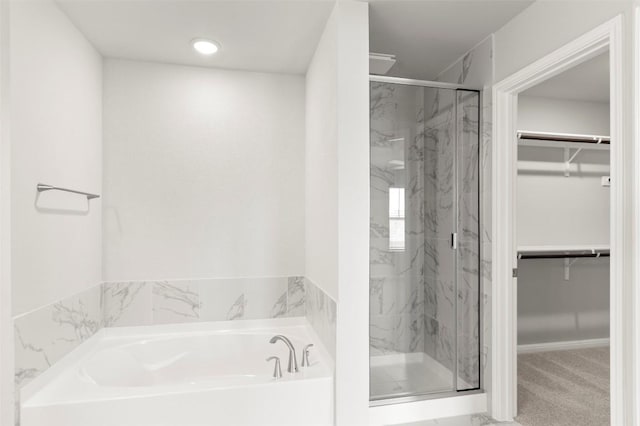 18305 Emu Ln, Manor, TX 78653 - full bath with a garden tub, a marble finish shower, and a spacious closet