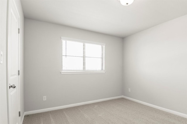 18305 Emu Ln, Manor, TX 78653 - unfurnished room featuring light carpet and baseboards