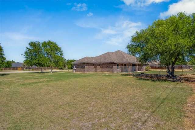 view of yard with fence
