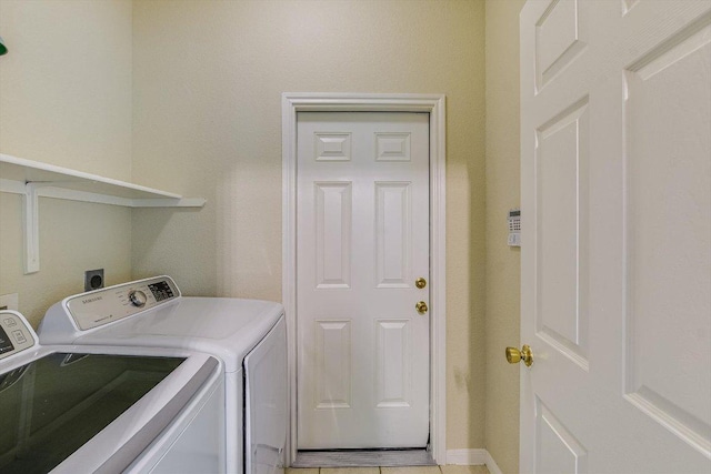 clothes washing area with laundry area and washing machine and dryer
