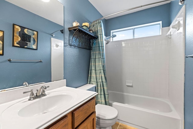 full bath with vanity, a textured wall, toilet, and shower / tub combo with curtain