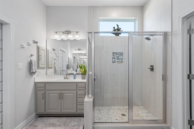 225 Palio Pl, Georgetown, TX 78628 - full bathroom featuring a shower stall, vanity, and baseboards