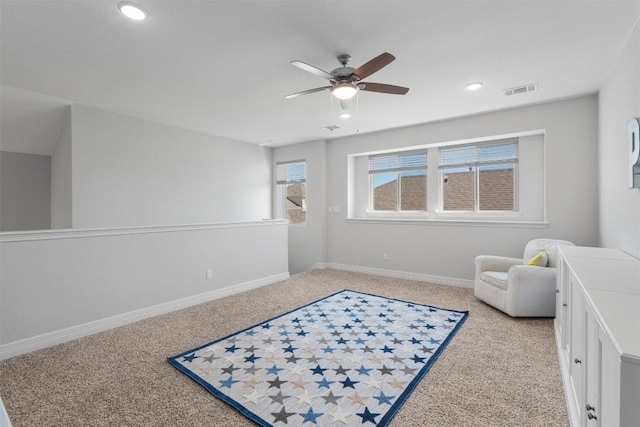 bedroom featuring light colored carpet, recessed lighting, and visible vents