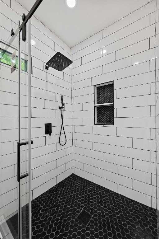 bathroom featuring a stall shower
