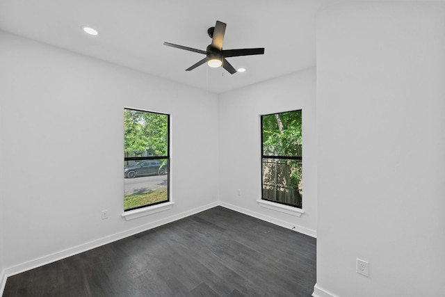 914 E 50th St, Austin, TX 78751 - spare room featuring plenty of natural light, dark wood finished floors, recessed lighting, ceiling fan, and baseboards