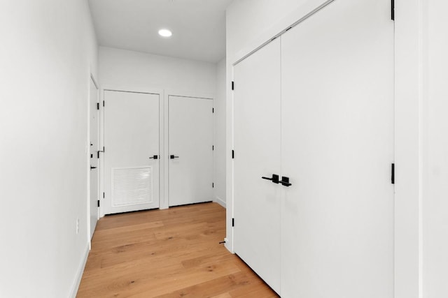 2209 S 1st St Unit 206, Austin, TX 78704 - corridor with recessed lighting, light wood-style floors, and baseboards