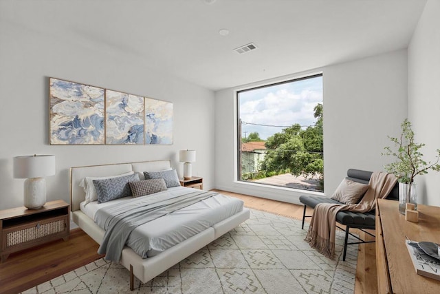 2209 S 1st St Unit 206, Austin, TX 78704 - bedroom with light wood finished floors