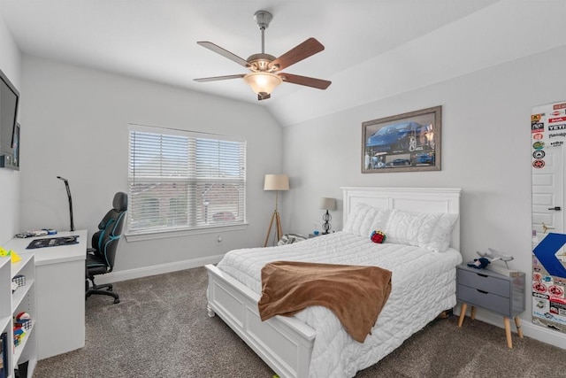 bedroom featuring dark colored carpet, a ceiling fan, baseboards, and vaulted ceiling