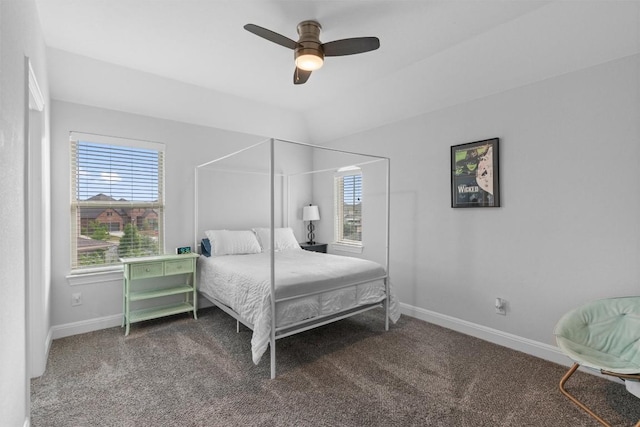 bedroom with baseboards, a ceiling fan, and carpet floors