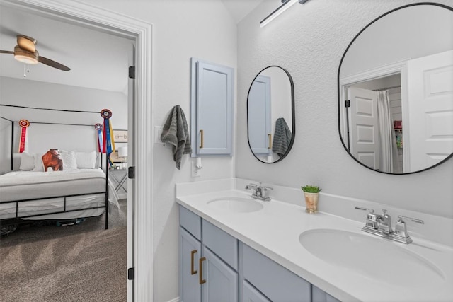 20620 Lukes Cv, Pflugerville, TX 78660 - ensuite bathroom with double vanity and ceiling fan