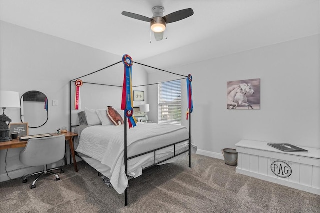 carpeted bedroom featuring baseboards and ceiling fan