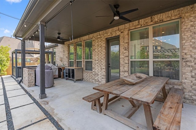 view of patio / terrace featuring ceiling fan and outdoor dining space