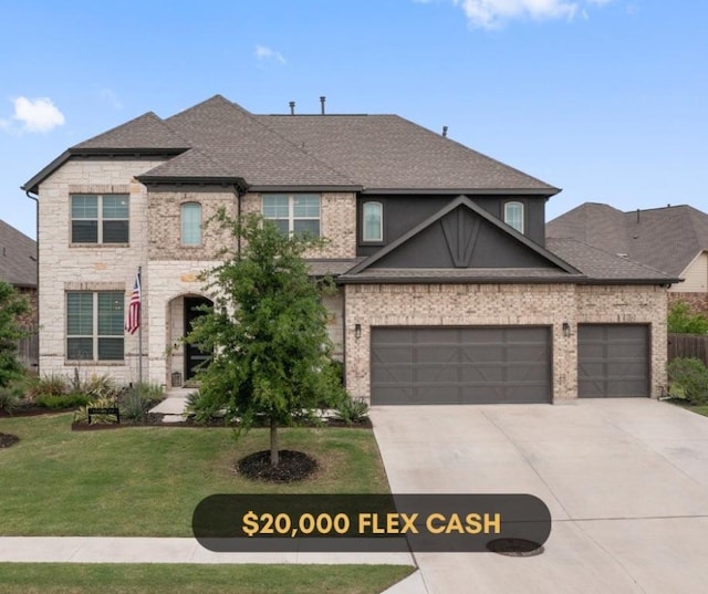 20620 Lukes Cv, Pflugerville, TX 78660 - french country home with driveway, a front lawn, a shingled roof, an attached garage, and stone siding