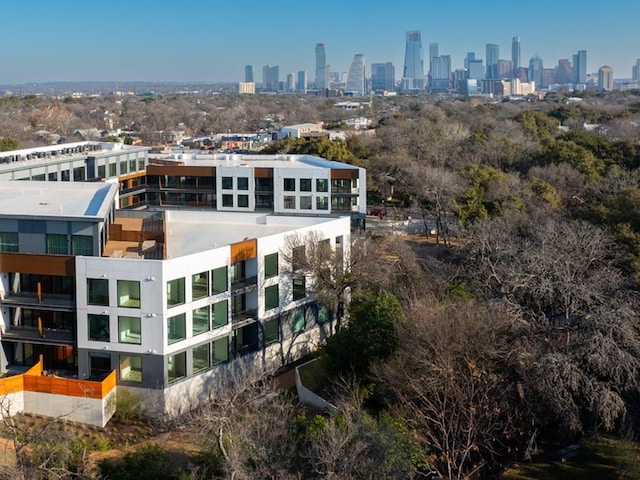 birds eye view of property featuring a view of city