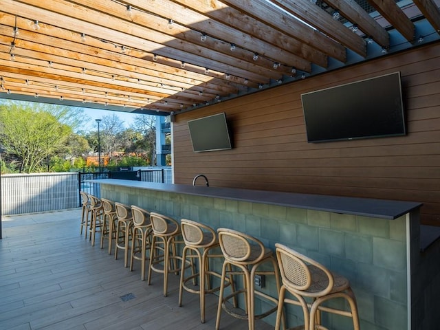deck with outdoor dry bar