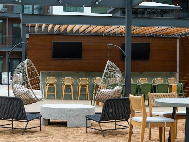 view of patio with outdoor dry bar