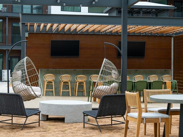 2209 S 1st St Unit 202, Austin, TX 78704 - view of patio featuring outdoor dry bar