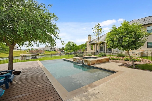 100 Red Barn Rd, Kingsland, TX 78639 - view of swimming pool with fence, a pool with connected hot tub, and a deck