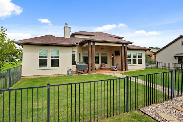 100 Red Barn Rd, Kingsland, TX 78639 - rear view of property with a ceiling fan, a patio area, stucco siding, a chimney, and a shingled roof