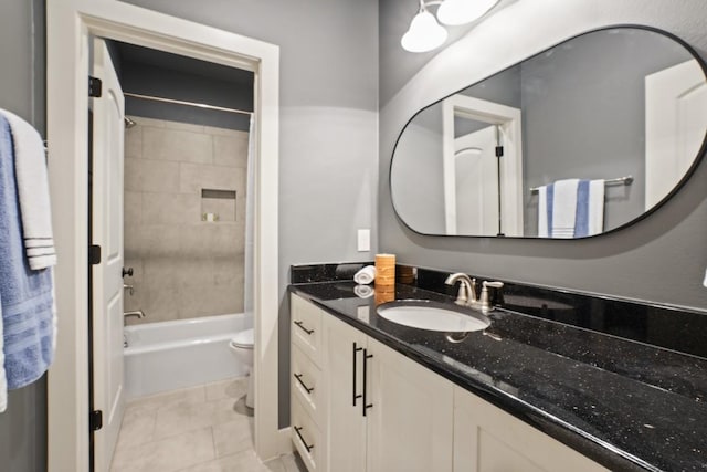 100 Red Barn Rd, Kingsland, TX 78639 - bathroom with toilet, vanity, tile patterned floors, and washtub / shower combination