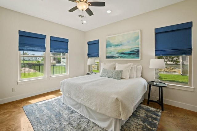 100 Red Barn Rd, Kingsland, TX 78639 - bedroom with baseboards, finished concrete floors, and ceiling fan