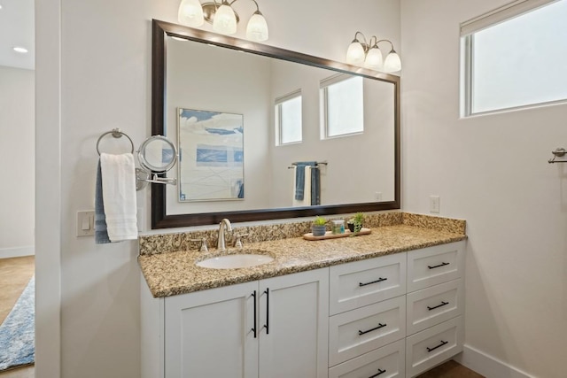 100 Red Barn Rd, Kingsland, TX 78639 - bathroom with vanity and baseboards