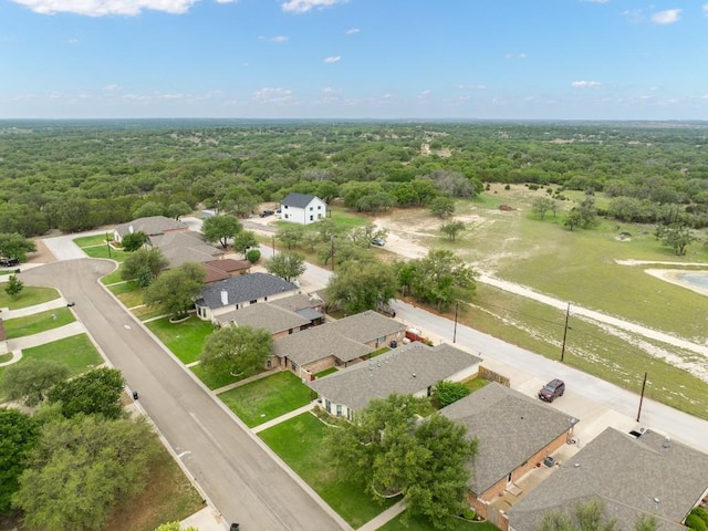 bird's eye view with a residential view and a wooded view