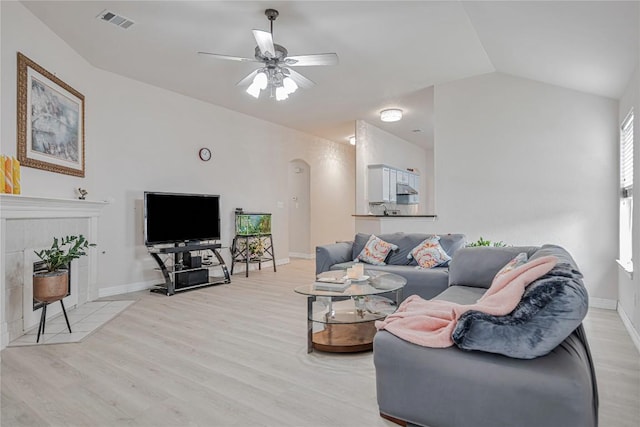 607 Columbine Ave, Cedar Park, TX 78613 - living area with light wood-style flooring, lofted ceiling, a ceiling fan, and plenty of natural light