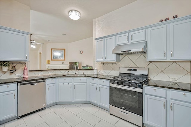 607 Columbine Ave, Cedar Park, TX 78613 - kitchen featuring appliances with stainless steel finishes, under cabinet range hood, a sink, a ceiling fan, and dark stone countertops