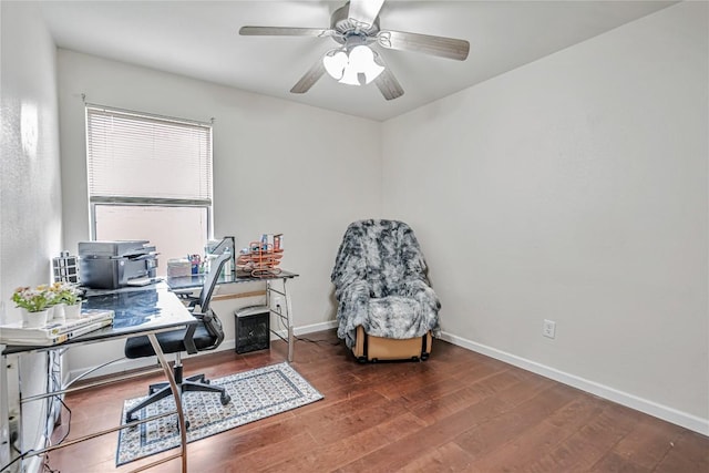 office featuring baseboards, a ceiling fan, and wood finished floors