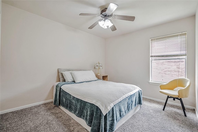 bedroom featuring carpet floors, baseboards, and ceiling fan