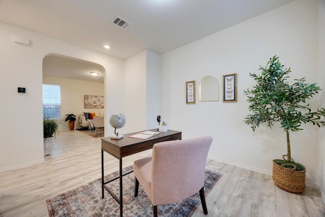 2950 E Old Settlers Blvd Unit 51, Round Rock, TX 78665 - office with arched walkways, light wood-style floors, and recessed lighting