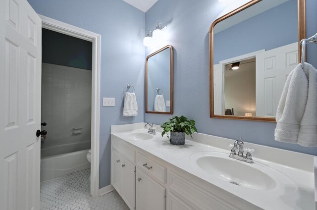 5908 Front Royal Dr, Austin, TX 78746 - bathroom with double vanity, tile patterned flooring, and shower / washtub combination
