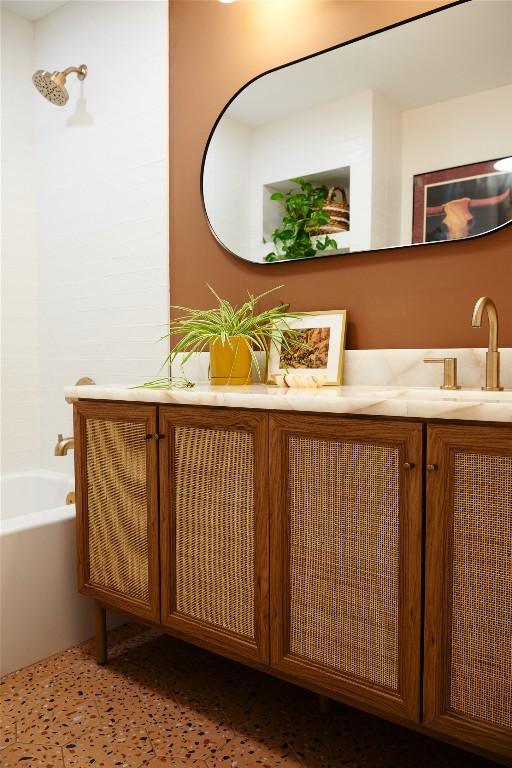 full bathroom featuring vanity and shower / washtub combination
