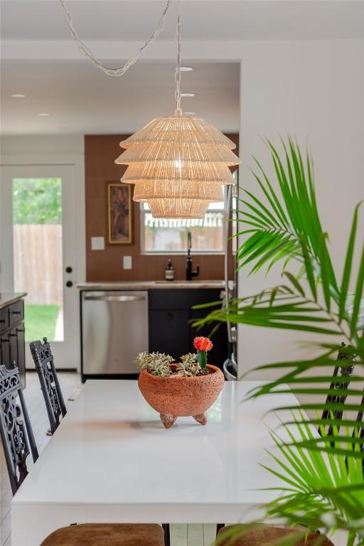 dining space with an inviting chandelier