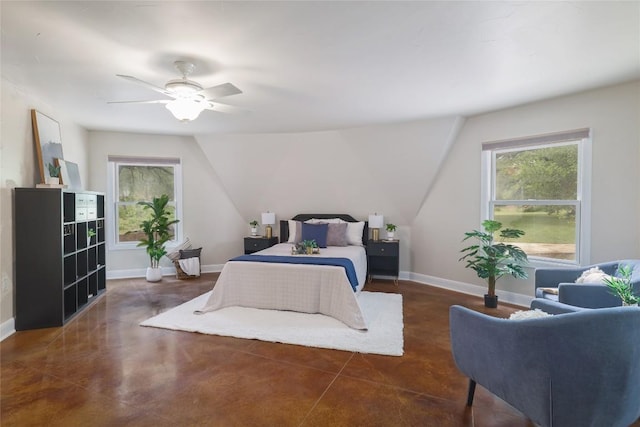 bedroom featuring baseboards, ceiling fan, and vaulted ceiling