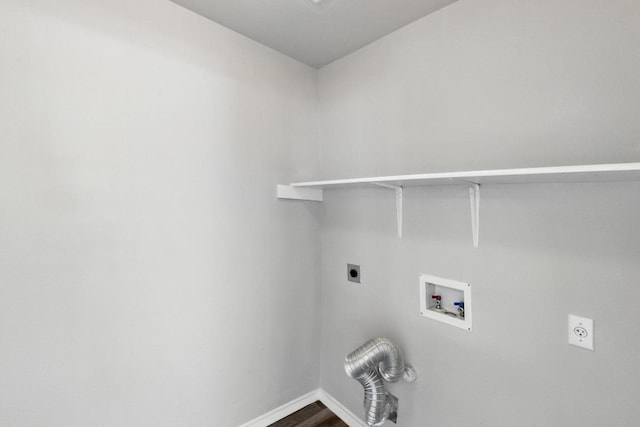 laundry room with laundry area, hookup for a washing machine, baseboards, and hookup for an electric dryer