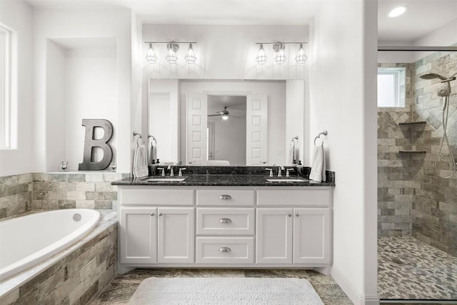 275 Axis Cir, Fredericksburg, TX 78624 - bathroom featuring tiled shower, a garden tub, double vanity, and ceiling fan