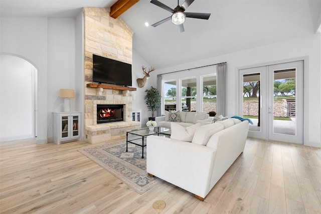 275 Axis Cir, Fredericksburg, TX 78624 - living area with beam ceiling, ceiling fan, high vaulted ceiling, french doors, and healthy amount of natural light
