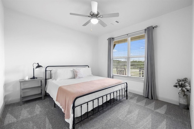 275 Axis Cir, Fredericksburg, TX 78624 - carpeted bedroom with baseboards and ceiling fan