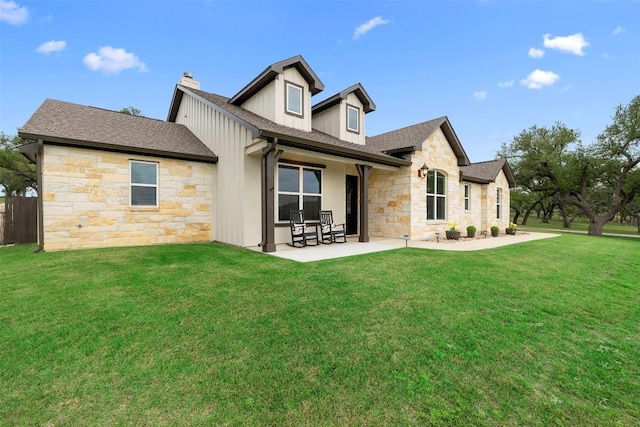 275 Axis Cir, Fredericksburg, TX 78624 - back of property featuring stone siding, a patio, roof with shingles, and a chimney